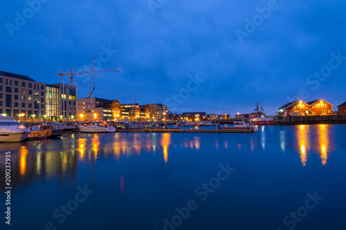 View of the marina and port in Bodo at night. Norway. Skyline of city.