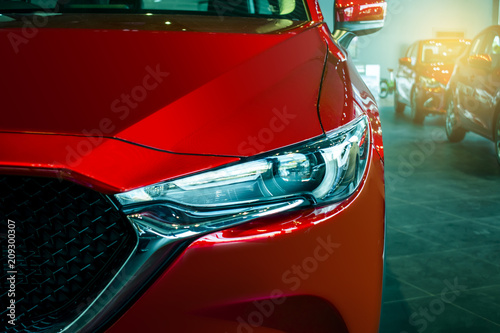 This Front car all new brand japan red color on room customer backbround parked in showroom of thailand for transport Illustrative editorial image.