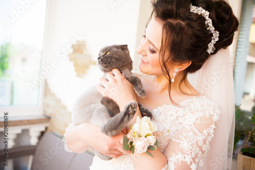 Beautiful bride with cat