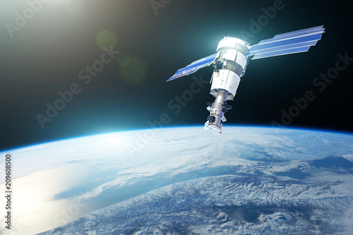 Research, probing, monitoring of in atmosphere. Communications satellite in orbit above the surface of the planet Earth. Elements of this image furnished by NASA.