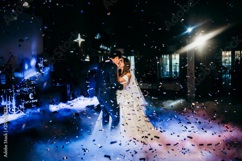 Wedding dance of happy couple in the restaurant 