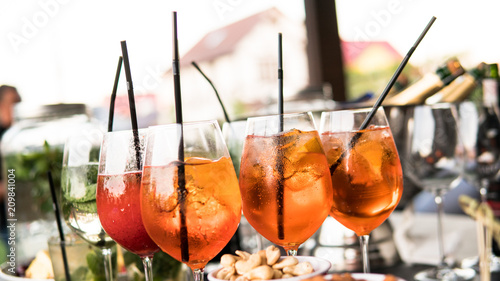 .process of preparation of a cocktail Aperol spritz close-up.