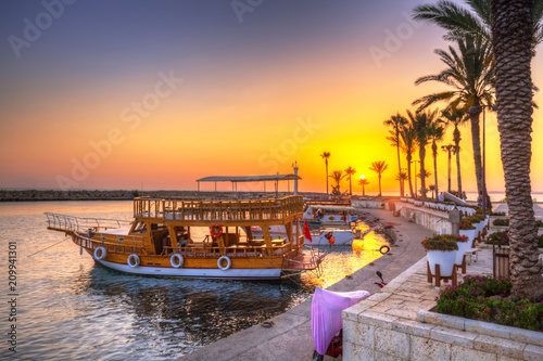 The harbour with boats in Side at sunset, Turkey