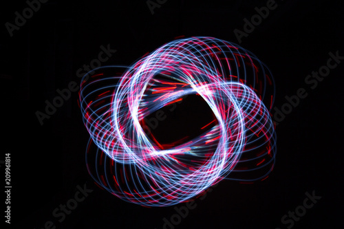 Light painting forming a dashed flower star shape