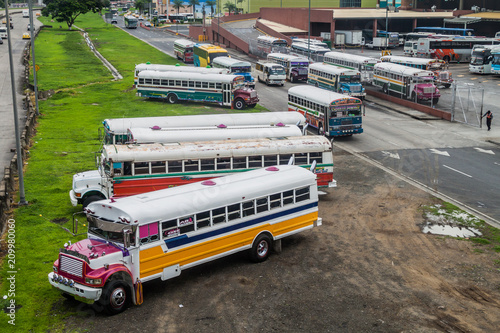 PANAMA CITY, PANAMA - MAY 30, 2016: Buses wait at Albrook Bus Terminal in Panama City.