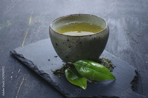 hot green tea in a traditional bowl