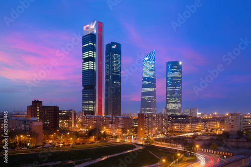 Madrid Four Towers financial district skyline at twilight in Madrid, Spain.