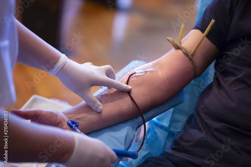 Blood donation hand. Nurse hands