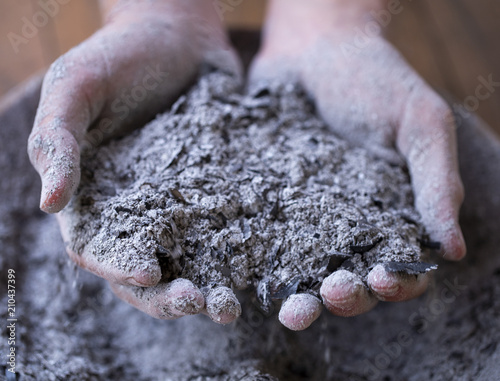 ashes in the hands of a teenager, ashes falling through your fingers