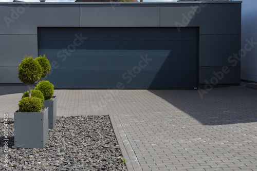 modern black garage in suburban street