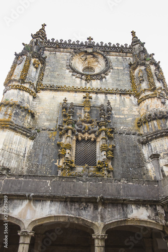 Facade of the Convent of Christ with its famous intricate Manueline window in medieval Templar castle in Tomar