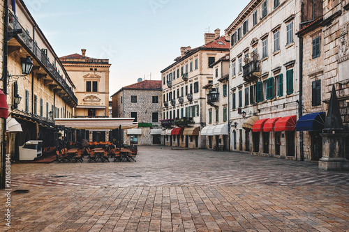 Square with old historical buildings in the ancient town Kotor in Montenegro