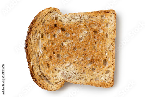 A single slice of whole wheat toast isolated on white from above.