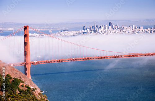 San Francisco Golden Gate bridge on foggy day dramatic evening light view from Marin Headland side