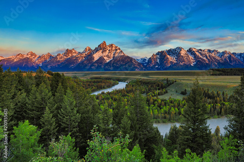 Sunrise view of the Grand Tetons from the Snake River overlook in Jackson Hole, Wyoming.