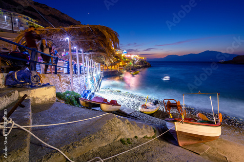 Beautiful Matala beach and village at night, Crete Island, Greece