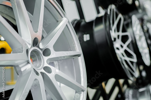 Close up of rims from a sports car. The concept of tuning the wheels of a car. Car wheel.