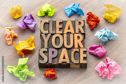 clear your space - word abstract in wood type