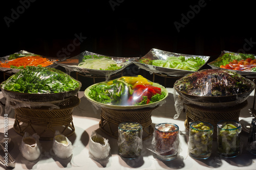 Vegetable salad on plastic wrap for buffet line in wedding party.