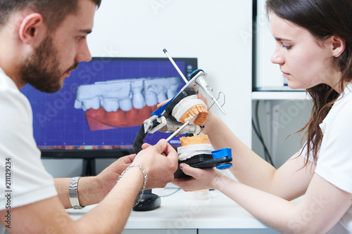 3d modelling in dental laboratory with technician