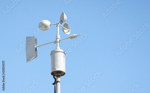 Wind vanes with blue sky background