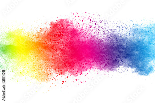 Abstract multi color powder explosion on white background. Freeze motion of dust particles splashing. Painted Holi in festival.