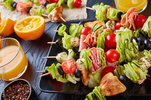 skewers with vegetables, meat and cheese