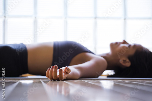 Woman practicing yoga indoors.