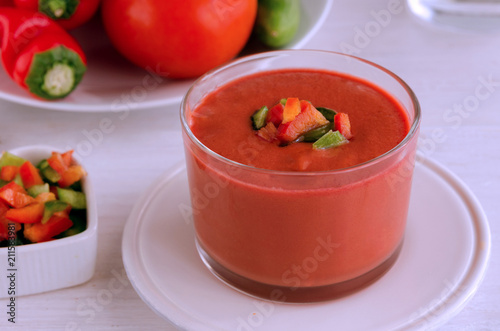 Andalusian gazpacho, Spanish tomato soup made from made of raw blended vegetables and perfect for hot summer. Healthy raw food background