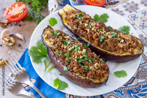 Baked eggplants with meat, walnut and vegetables. Traditional middle eastern or arab dish.