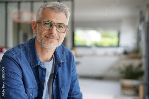 Middle-aged guy with eyeglasses and blue shirt