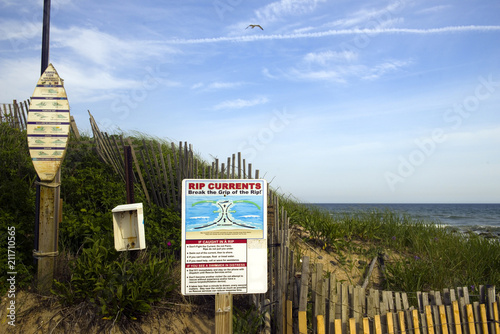 Ditch Plains Montauk New York rip current warning and surfer rule signs