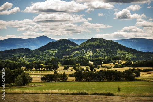 Mountain landscape, Karkonosze Mountains with clouds in the background.