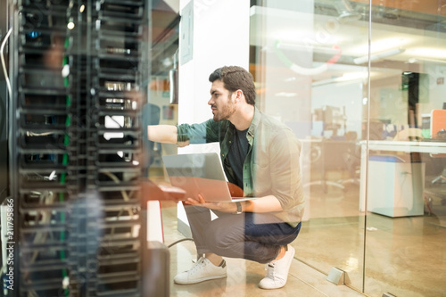 Network administrator in server room