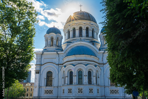 Lithuania, View between green trees on ancient Sankt Michael the Archangel Church in Kaunas