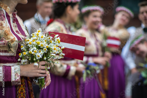 Song and dance festival in Latvia. Procession in Riga. Elements of ornaments and flowers. Latvia 100 years.