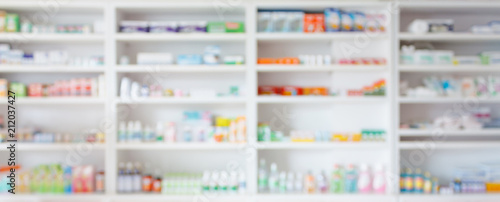 Pharmacy drugstore blur abstract backbround with medicine and healthcare product on shelves