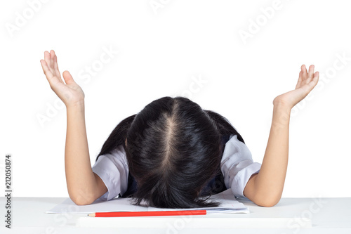 Asian Chinese little girl in school uniform sleeping on the table