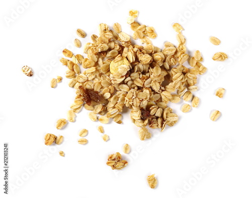 Crunchy granola, muesli pile isolated on white, top view