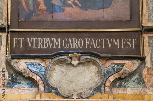 Pavia, Italy. 13 February 2017. The inscription "Et Verbum caro factum est" meaning "And the Word became flesh" in Duomo di Pavia (Pavia Cathedral)