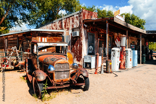 abandoned retro car in Route 66 gas station, Arizona, Usa