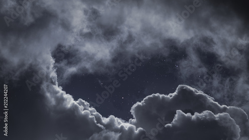 Cloudy night skly with stars