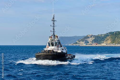 Tug boat with towing rope