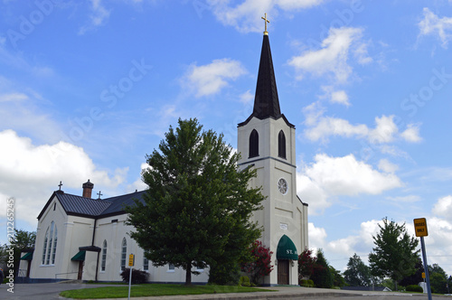 Christian landscape photo of a majestic Catholic church in a small town