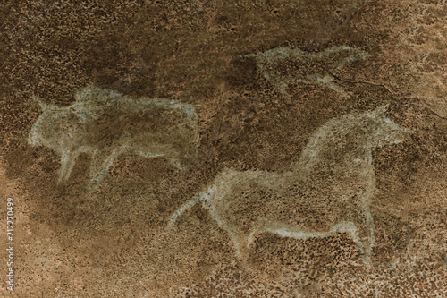 image of ancient animals on the wall of the cave. ancient art. stone Age. era. era.