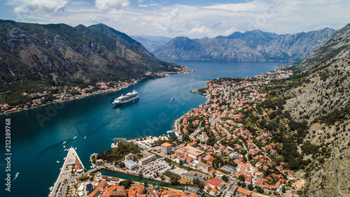Aerial beautiful View of Kotor bay. Cruise ship docked in beautiful summer day.
