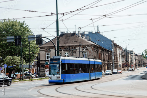 Street of the city of Krakow. The old Town. Public transport on the streets. Trams and buses. Polesha. City center.