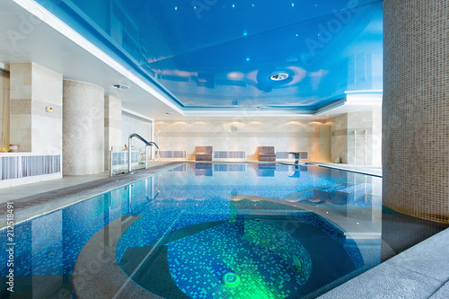 Indoor swimming pool in hotel spa center