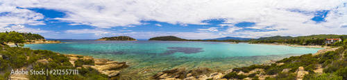 Beautiful panorama with the Mediterranean sea in Greece. crystal and colorful water, rocks, vegetation, beac