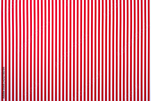 top view of white and red striped surface for background